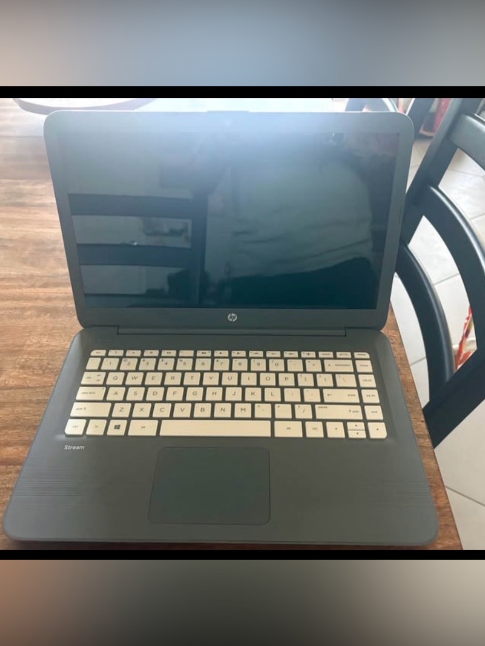 HP Laptop with Black Body and White Keyset